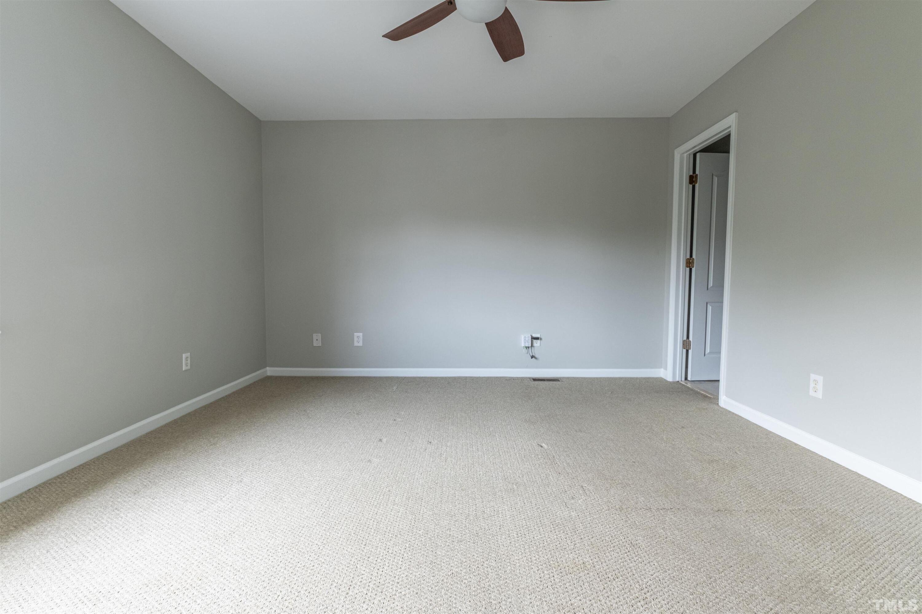 125 Old Grove Lane Apex, NC 27502 - Photo 11 of 30 a view of a room with a projector