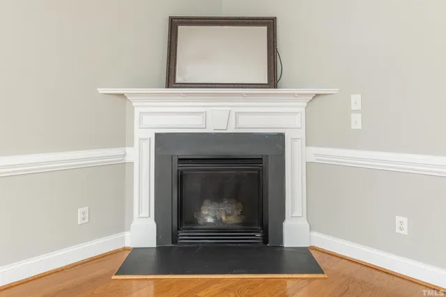 a living room with a fireplace