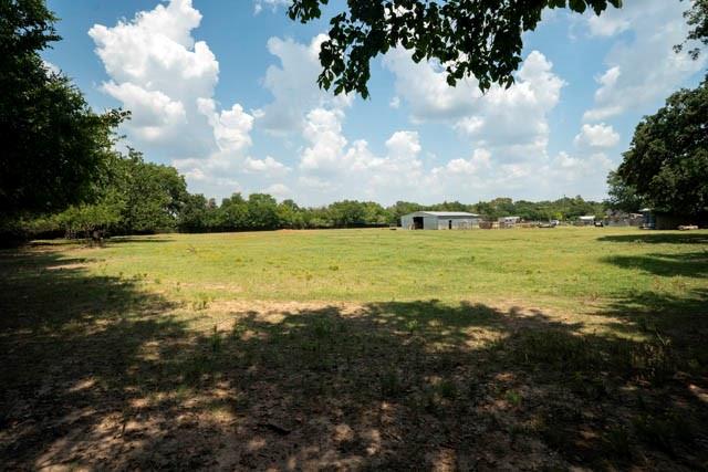 111 South Briaroaks Road Burleson, TX 76028 - Photo 15 of 39 a view of an ocean and beach