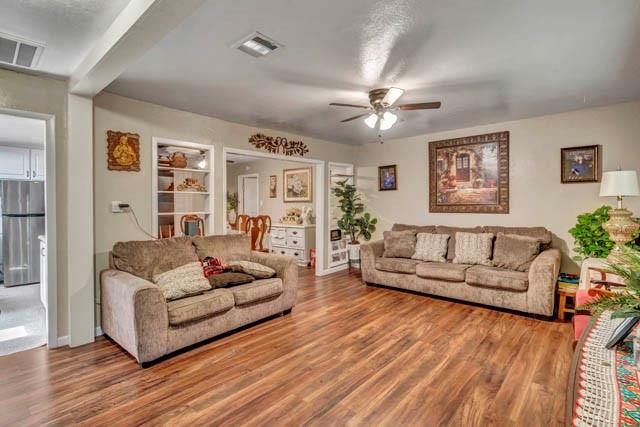 111 South Briaroaks Road Burleson, TX 76028 - Photo 22 of 39 a living room with furniture and a large window