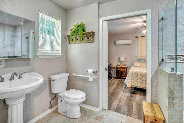 111 South Briaroaks Road Burleson, TX 76028 - Photo 23 of 39 a bathroom with a sink toilet and shower