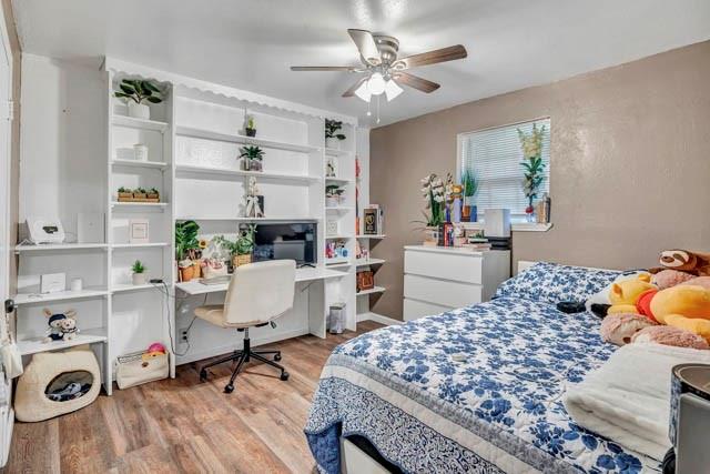 111 South Briaroaks Road Burleson, TX 76028 - Photo 24 of 39 a bedroom with a bed and a window