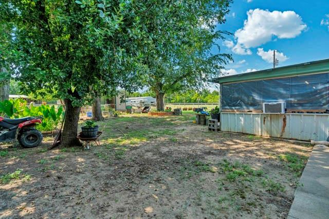 111 South Briaroaks Road Burleson, TX 76028 - Photo 36 of 39 a view of a house with backyard