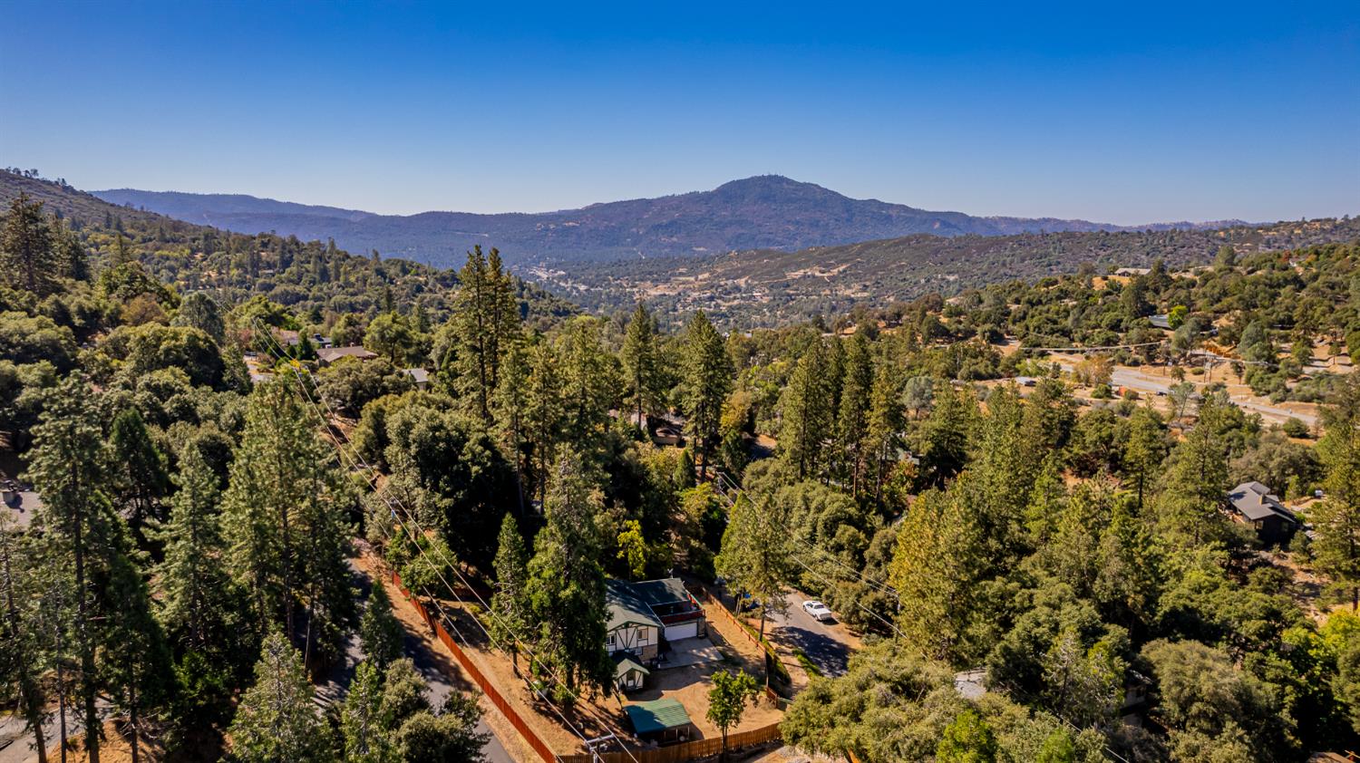 42585 Buckeye Road Oakhurst, CA 93644 - Photo 55 of 55 a view of a town with mountains in the background