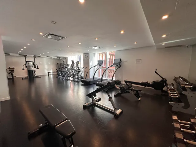 a view of a room with gym equipment