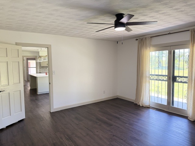 6241 Wards Mill Road Marion, IL 62959 - Photo 10 of 29 an empty room with wooden floor and windows