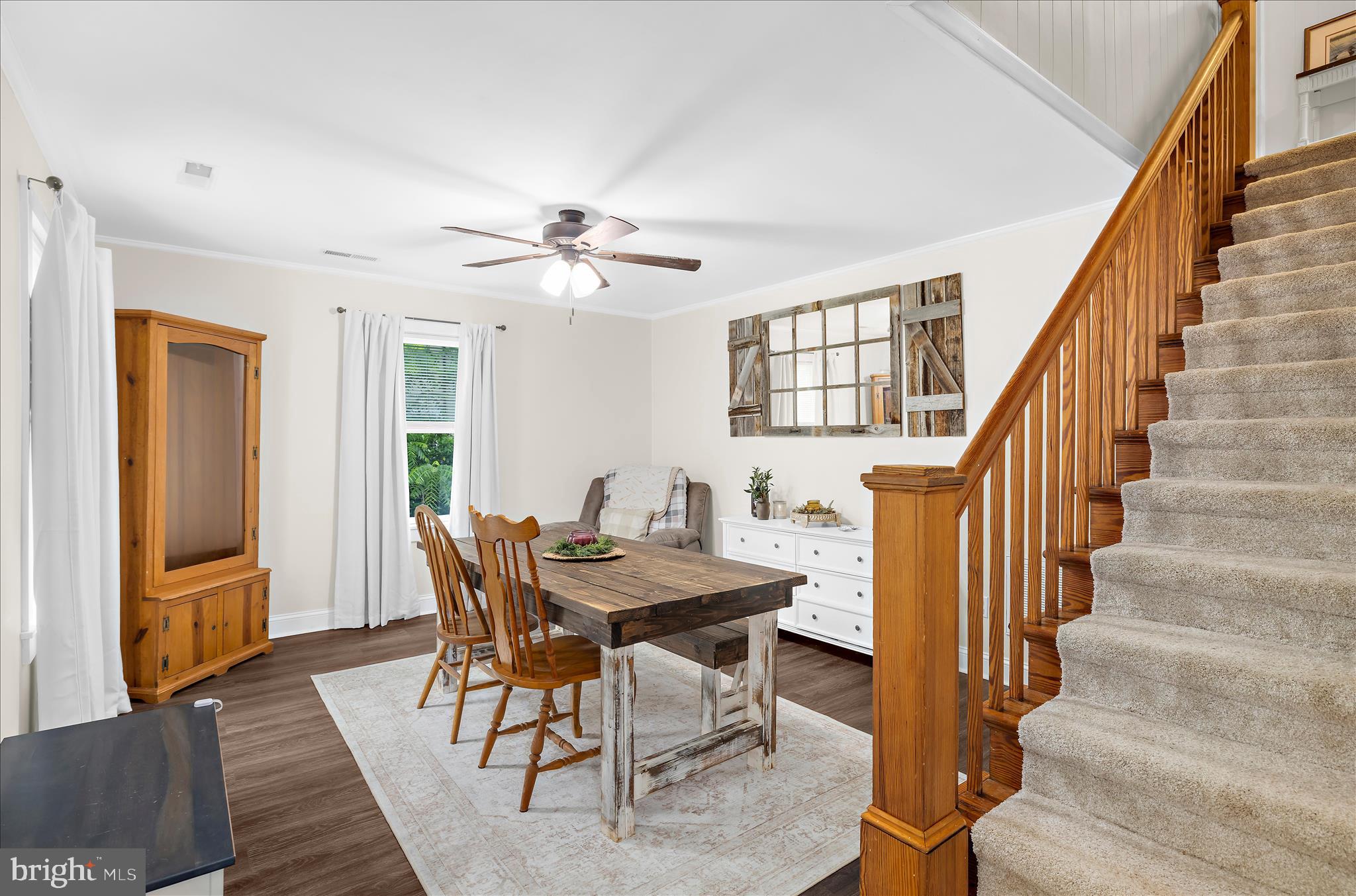 11994 Cordova Road Cordova, MD 21625 - Photo 11 of 57 a view of a dining room with furniture and wooden floor