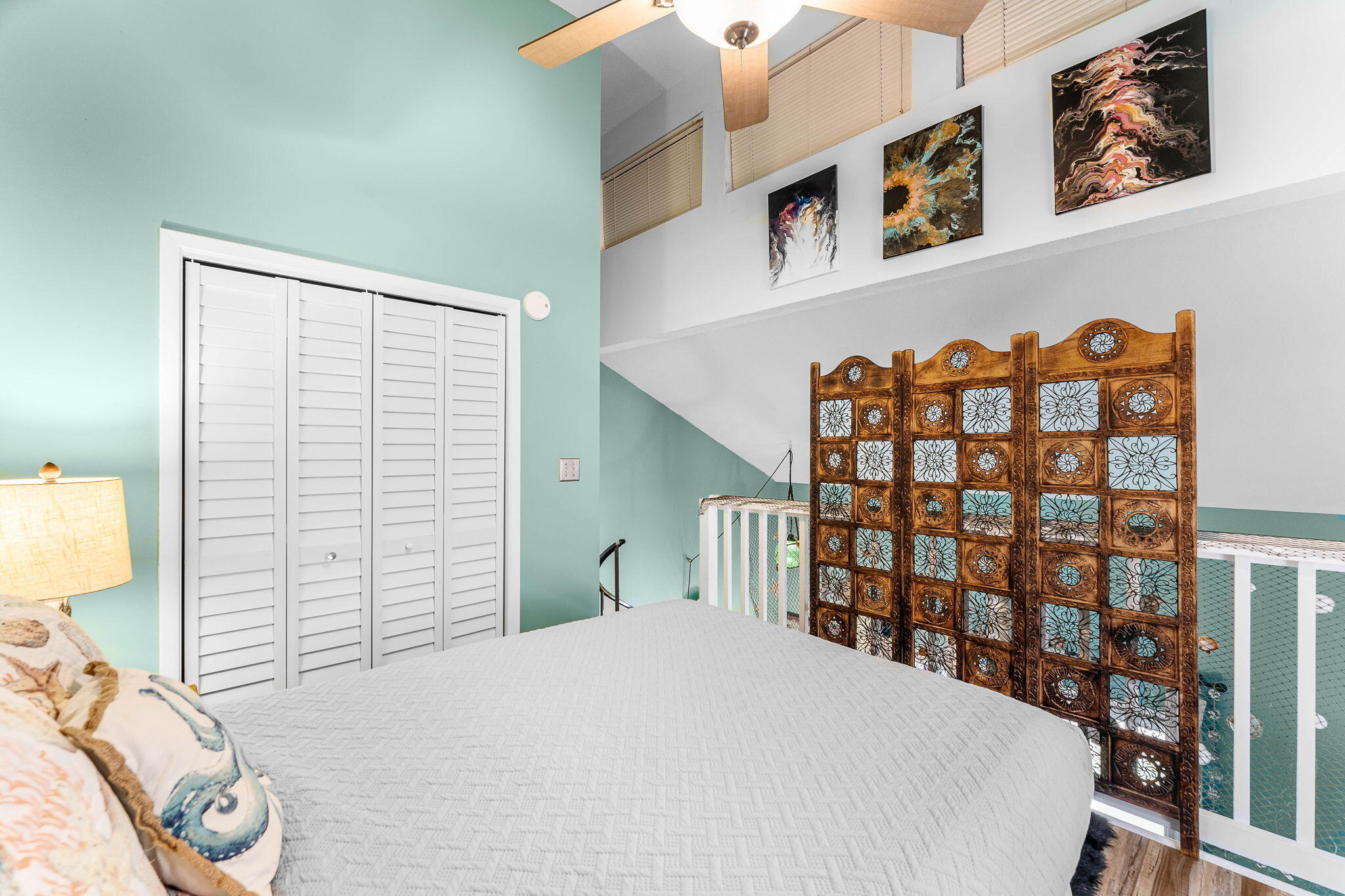 17614 Front Beach Road, Unit D13 Panama City Beach, FL 32413 - Photo 11 of 46 a bedroom with a bed and a window