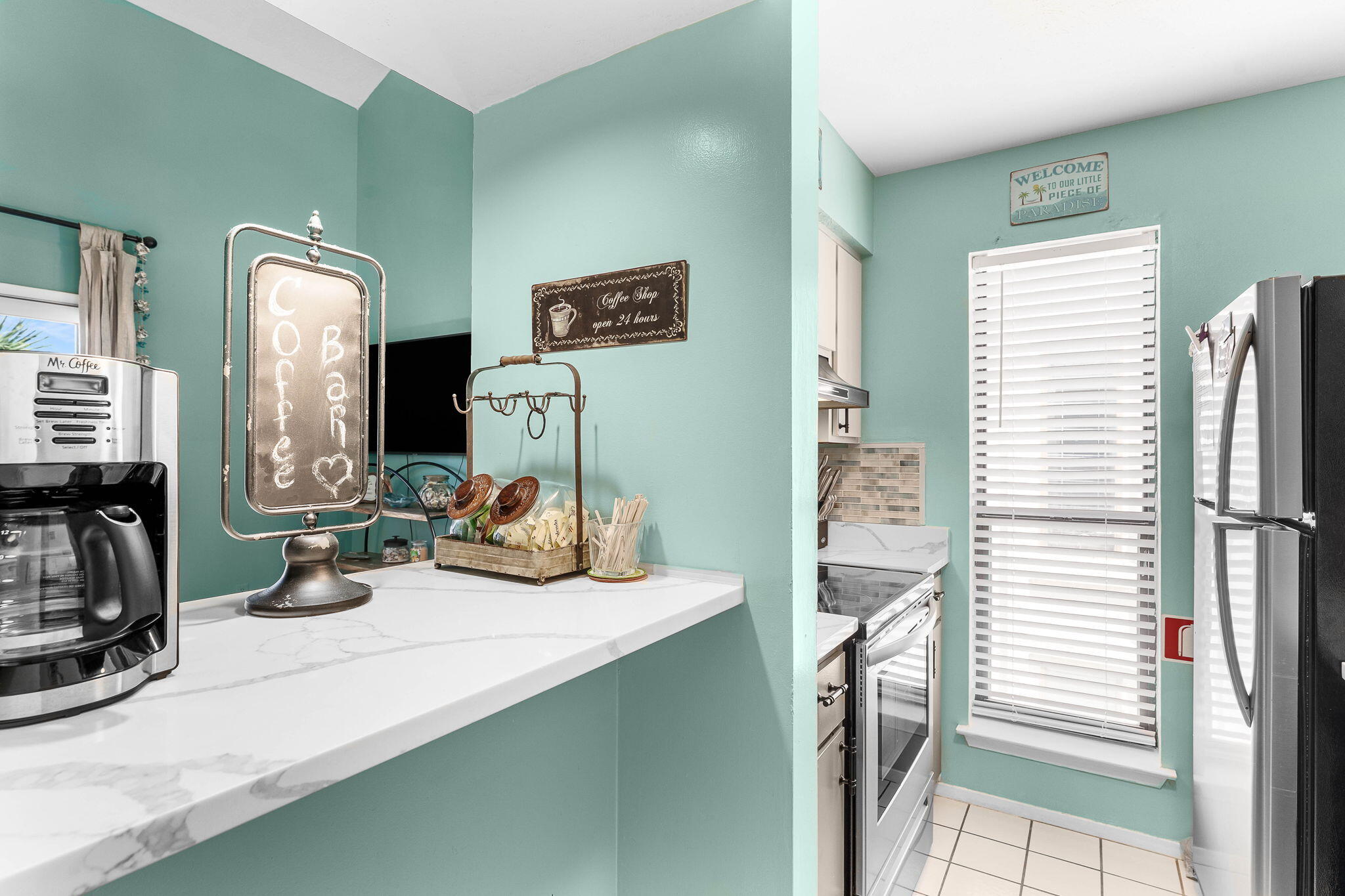 17614 Front Beach Road, Unit D13 Panama City Beach, FL 32413 - Photo 15 of 46 a view of living room with furniture and flat screen tv