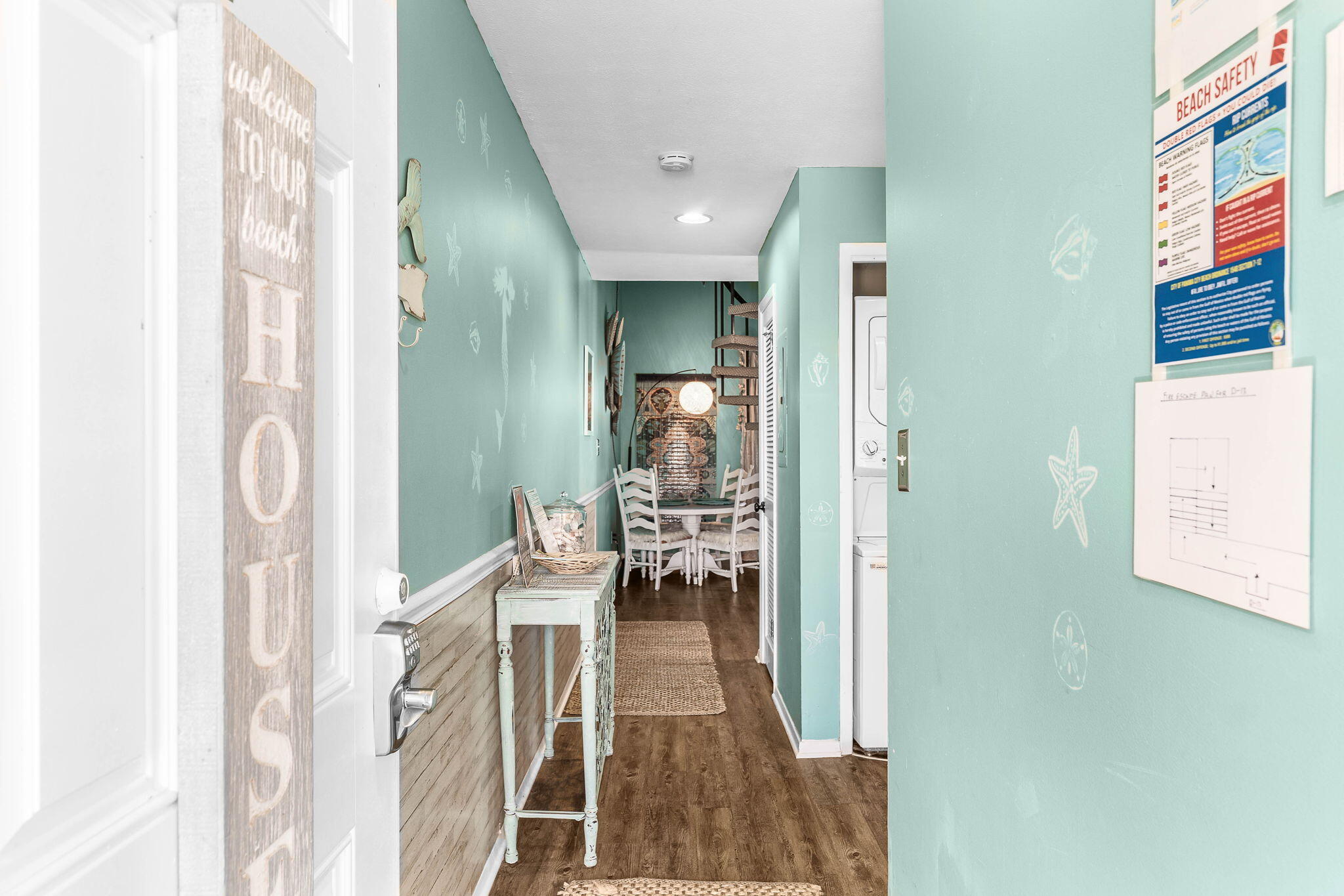 17614 Front Beach Road, Unit D13 Panama City Beach, FL 32413 - Photo 23 of 46 a view of a hallway with dining area and livingroom view