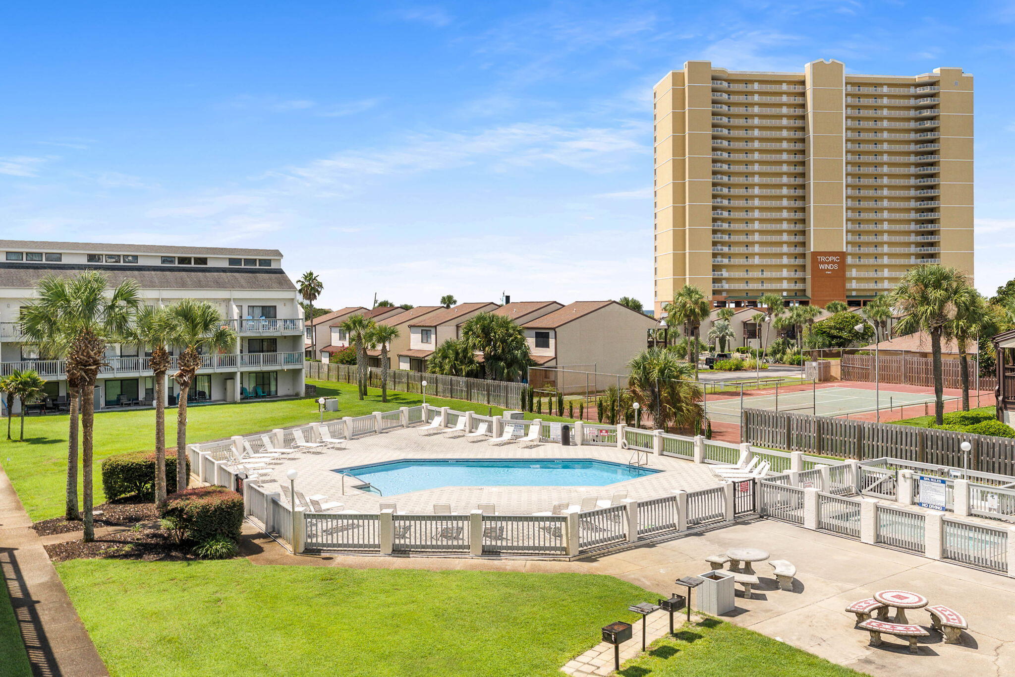 17614 Front Beach Road, Unit D13 Panama City Beach, FL 32413 - Photo 27 of 46 a view of a swimming pool with a patio