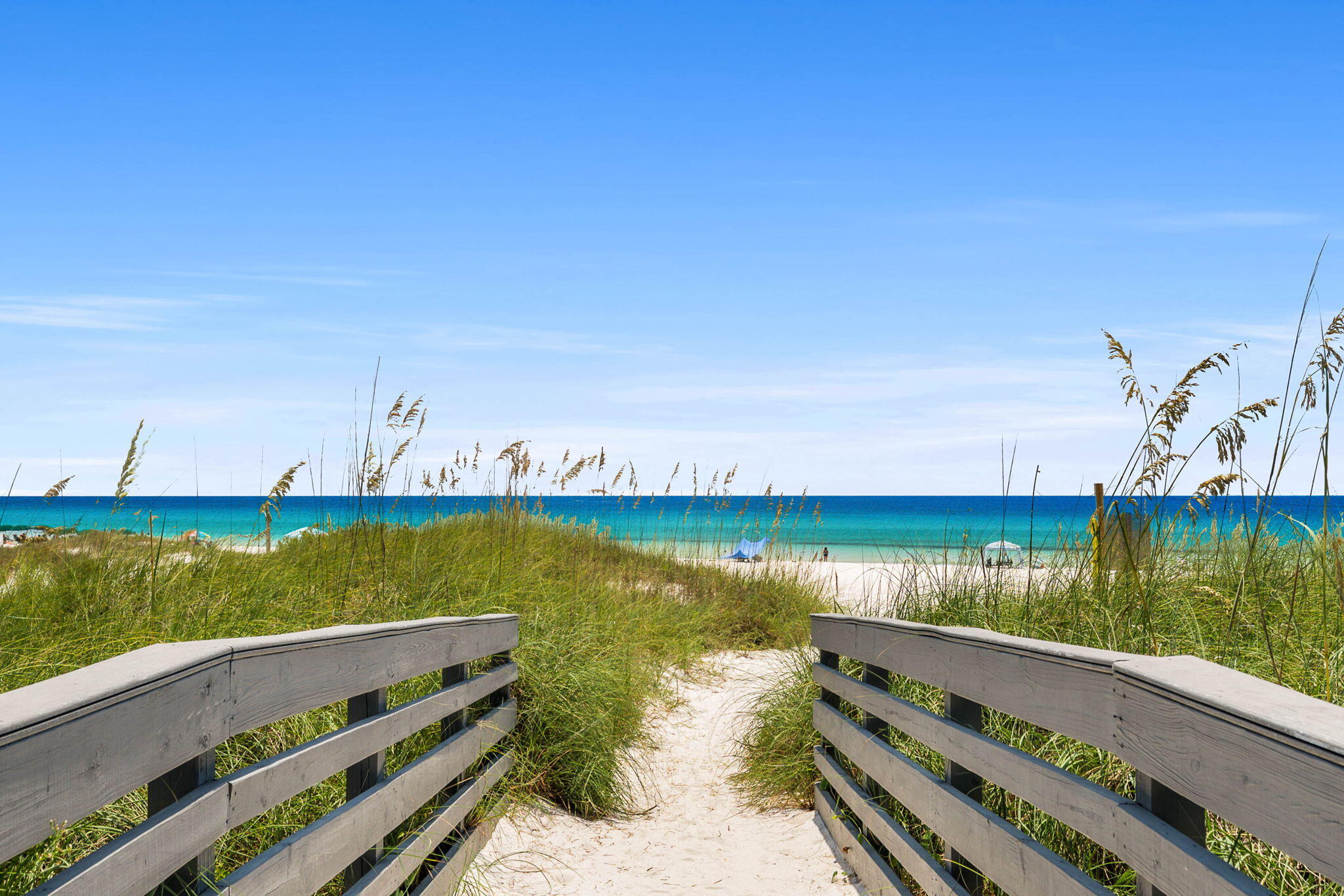 17614 Front Beach Road, Unit D13 Panama City Beach, FL 32413 - Photo 34 of 46 a view of a lake with houses in the background