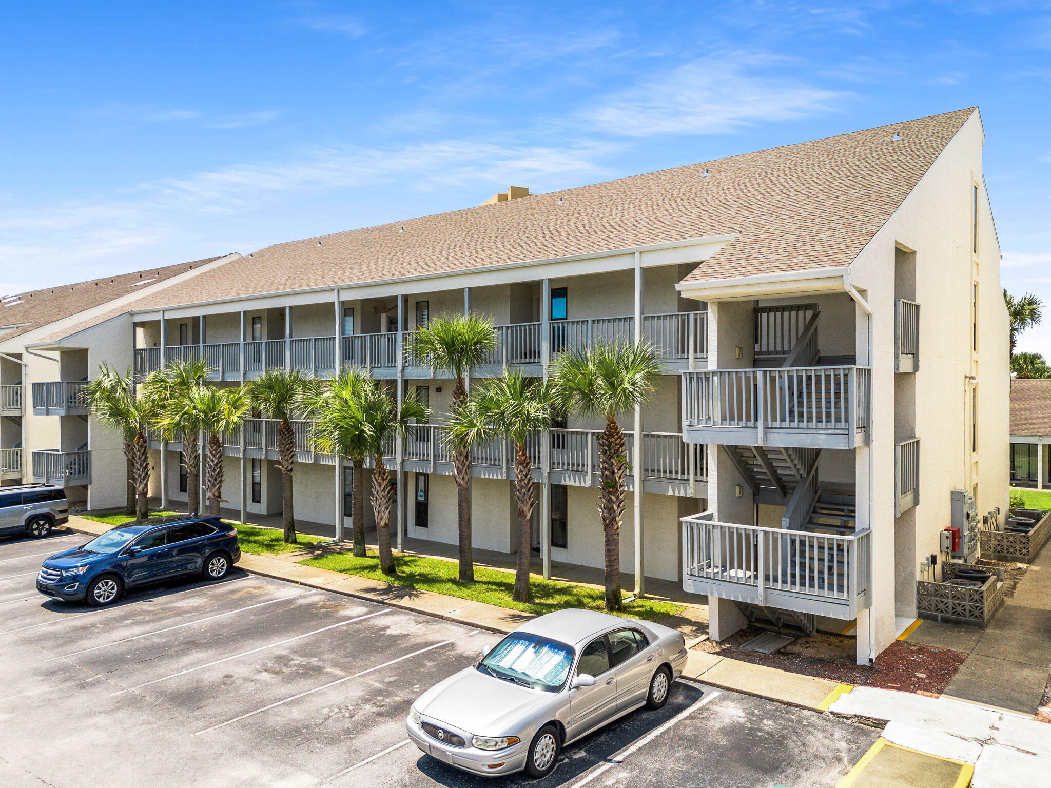 17614 Front Beach Road, Unit D13 Panama City Beach, FL 32413 - Photo 36 of 46 a view of a house with backyard and porch