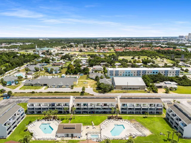 a view of a swimming pool with an ocean view