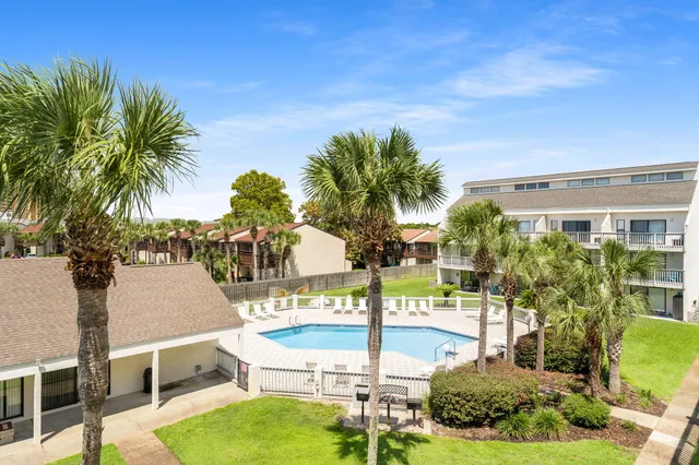 a view of a swimming pool with a patio