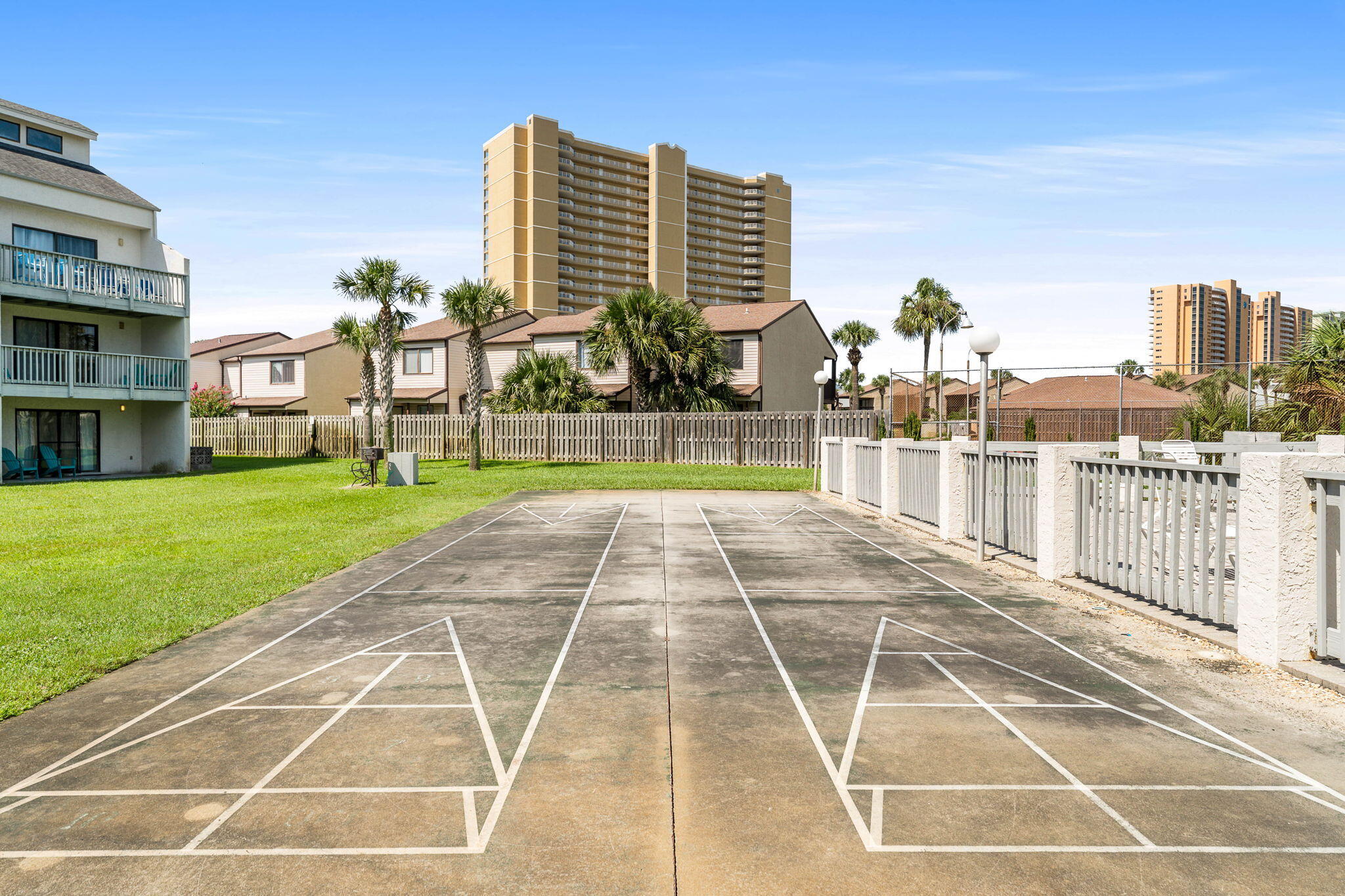 17614 Front Beach Road, Unit D13 Panama City Beach, FL 32413 - Photo 46 of 46 a view of a swimming pool with a yard and plants