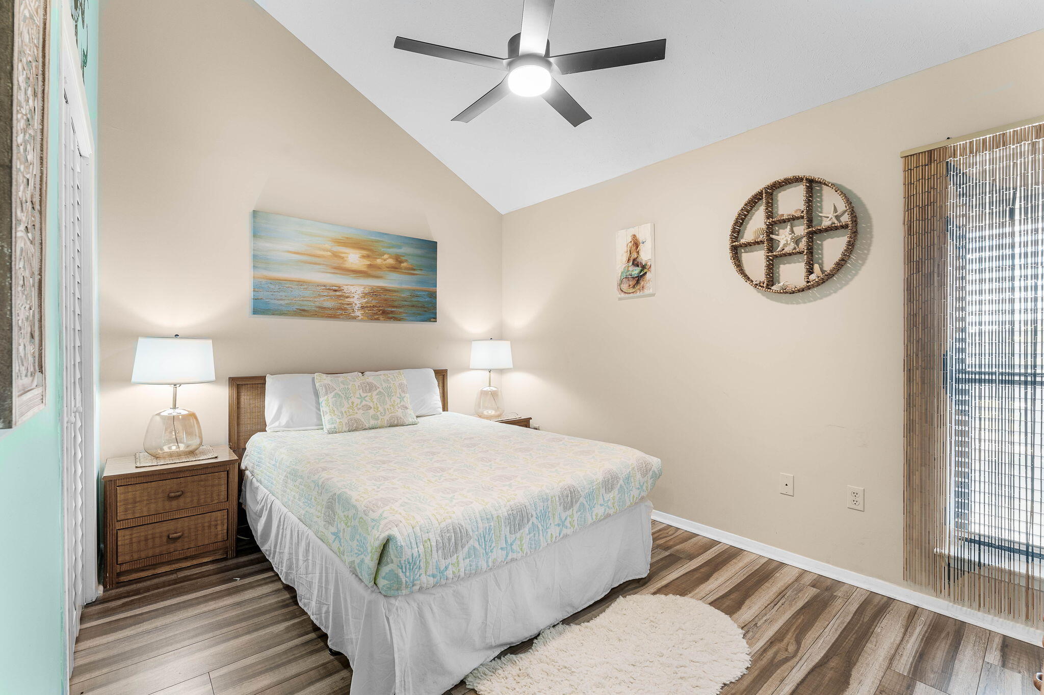 17614 Front Beach Road, Unit D13 Panama City Beach, FL 32413 - Photo 6 of 46 a bedroom with a large bed and a window
