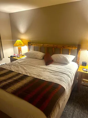 a view of a house with a yard and garage