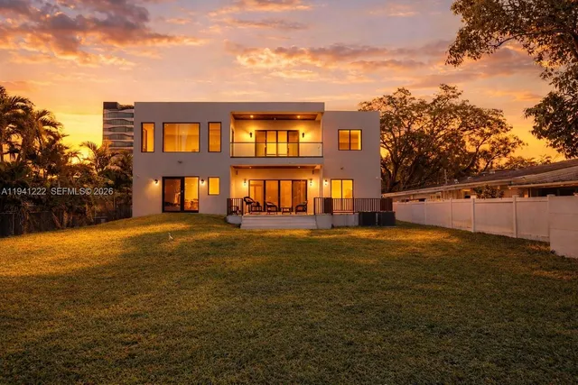 a backyard of a house with lots of green space