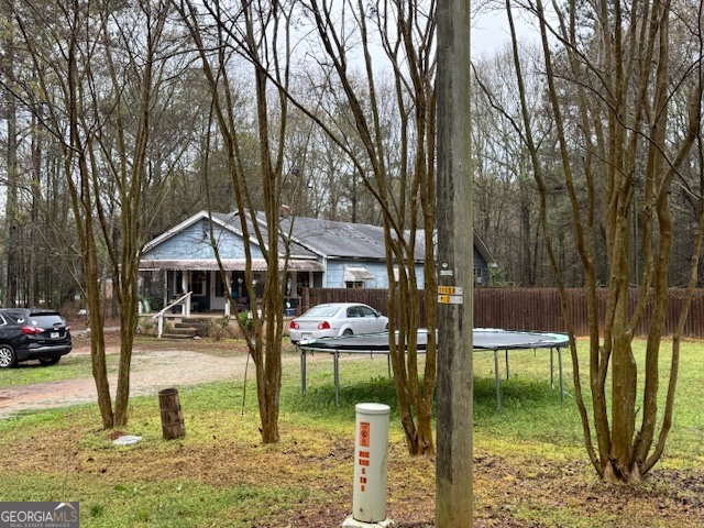 60 Cherry Street Hartwell, GA 30643 - Photo 2 of 18 a front view of a house with garden