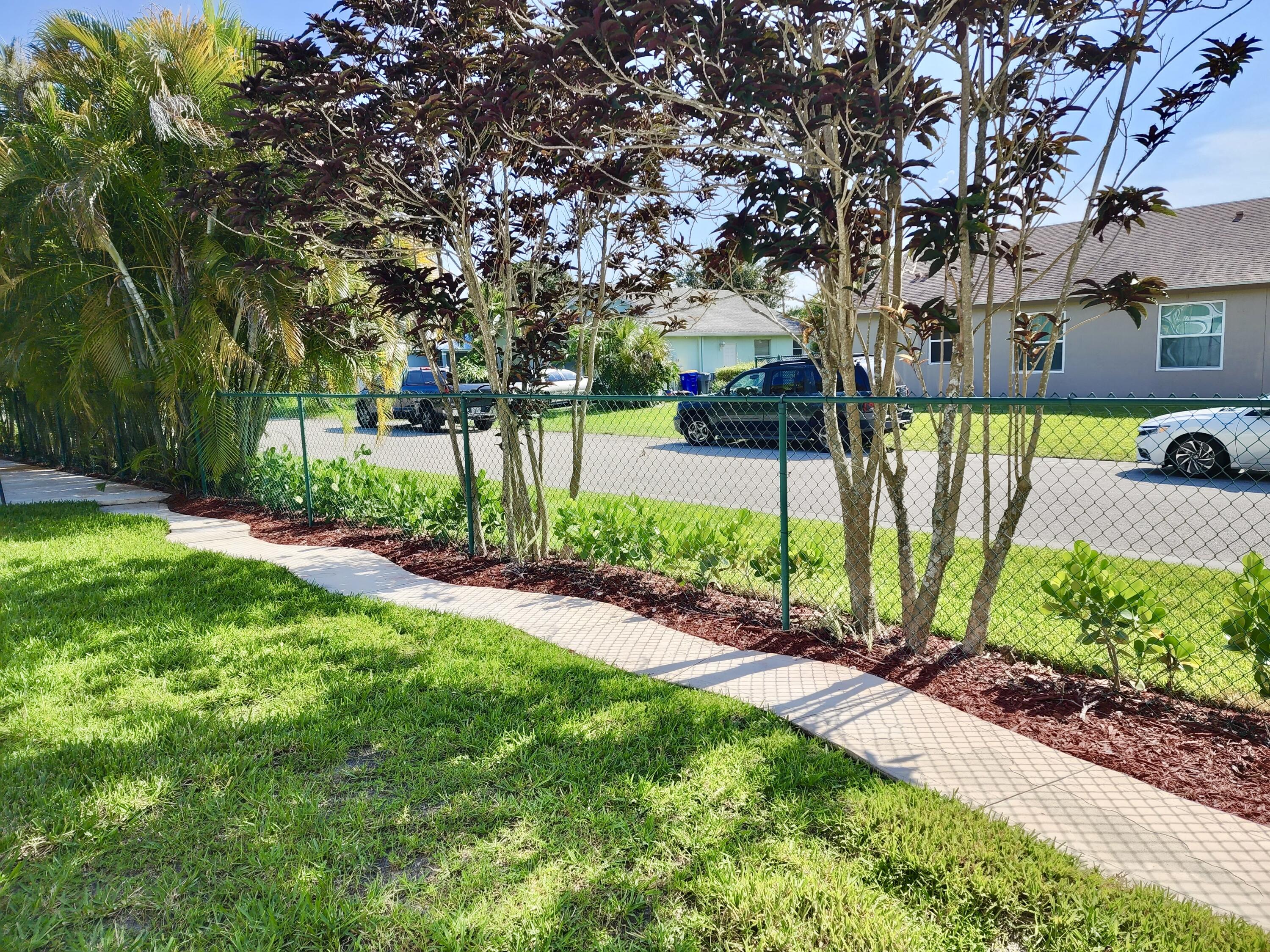 2464 Southwest Omega Way Stuart, FL 34997 - Photo 28 of 70 West Yard