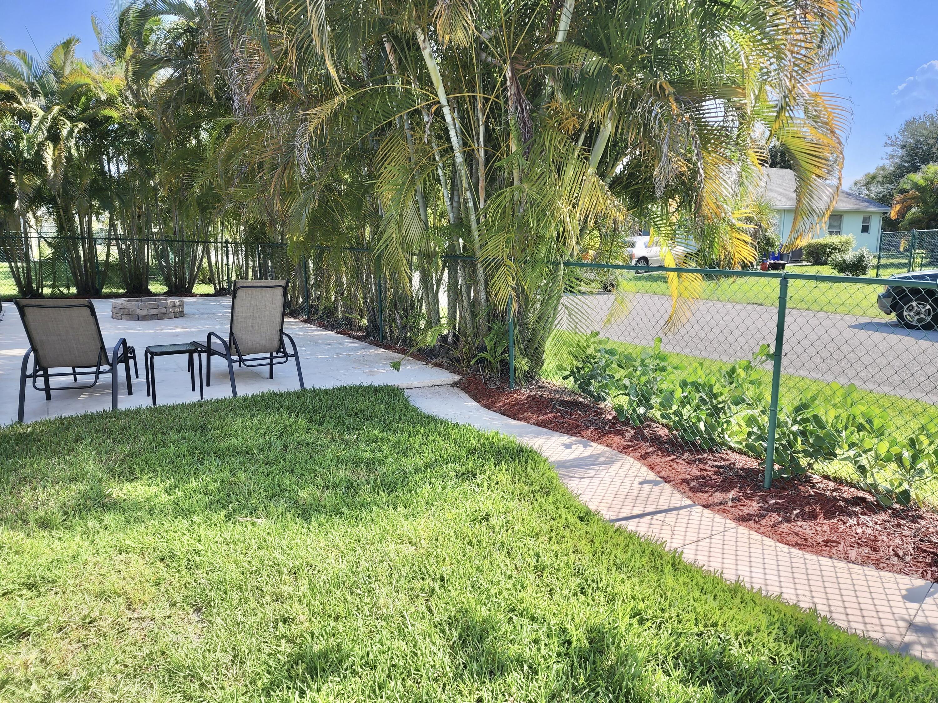 2464 Southwest Omega Way Stuart, FL 34997 - Photo 29 of 70 West Yard