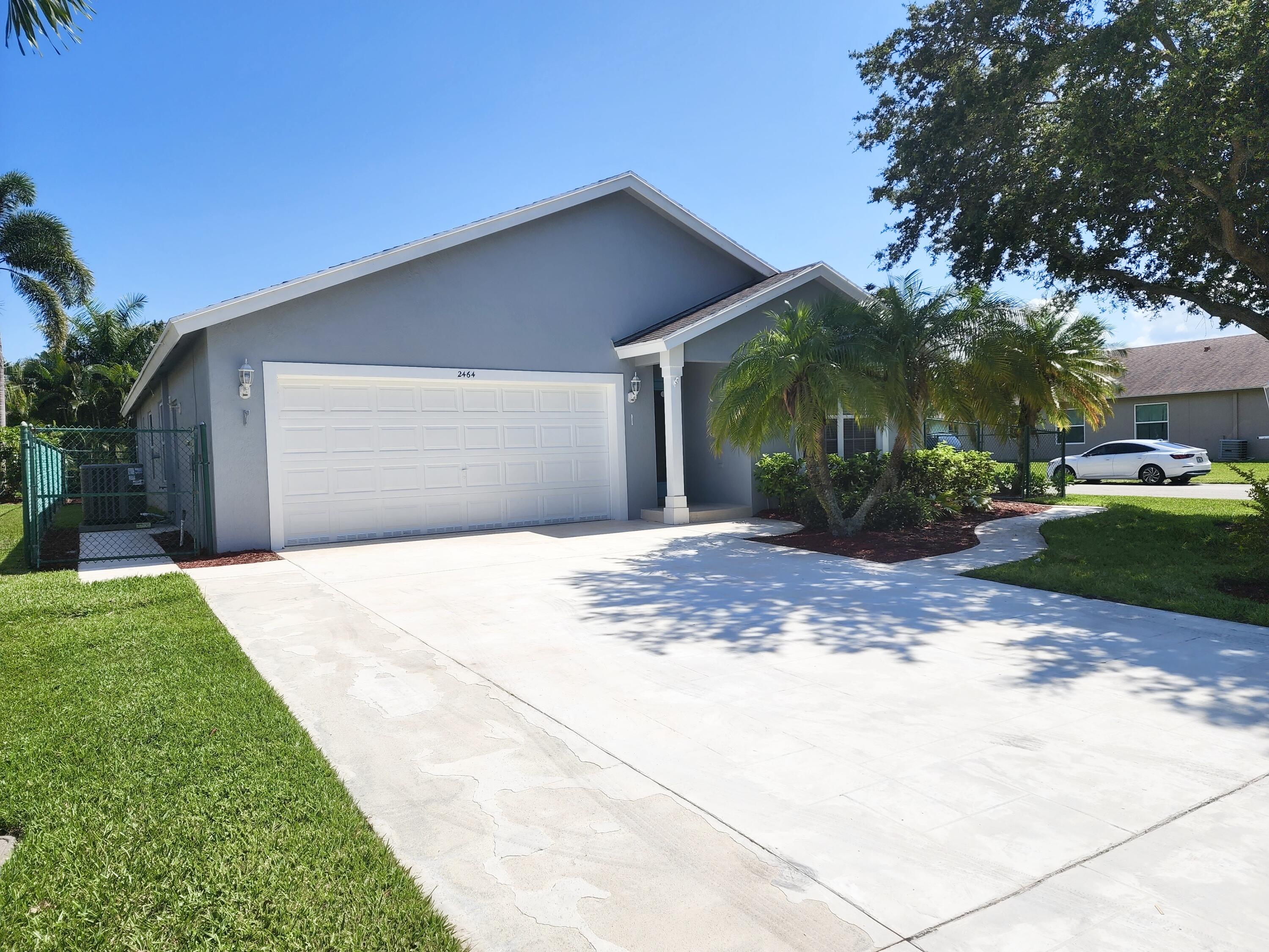2464 Southwest Omega Way Stuart, FL 34997 - Photo 3 of 70 Front Of Home