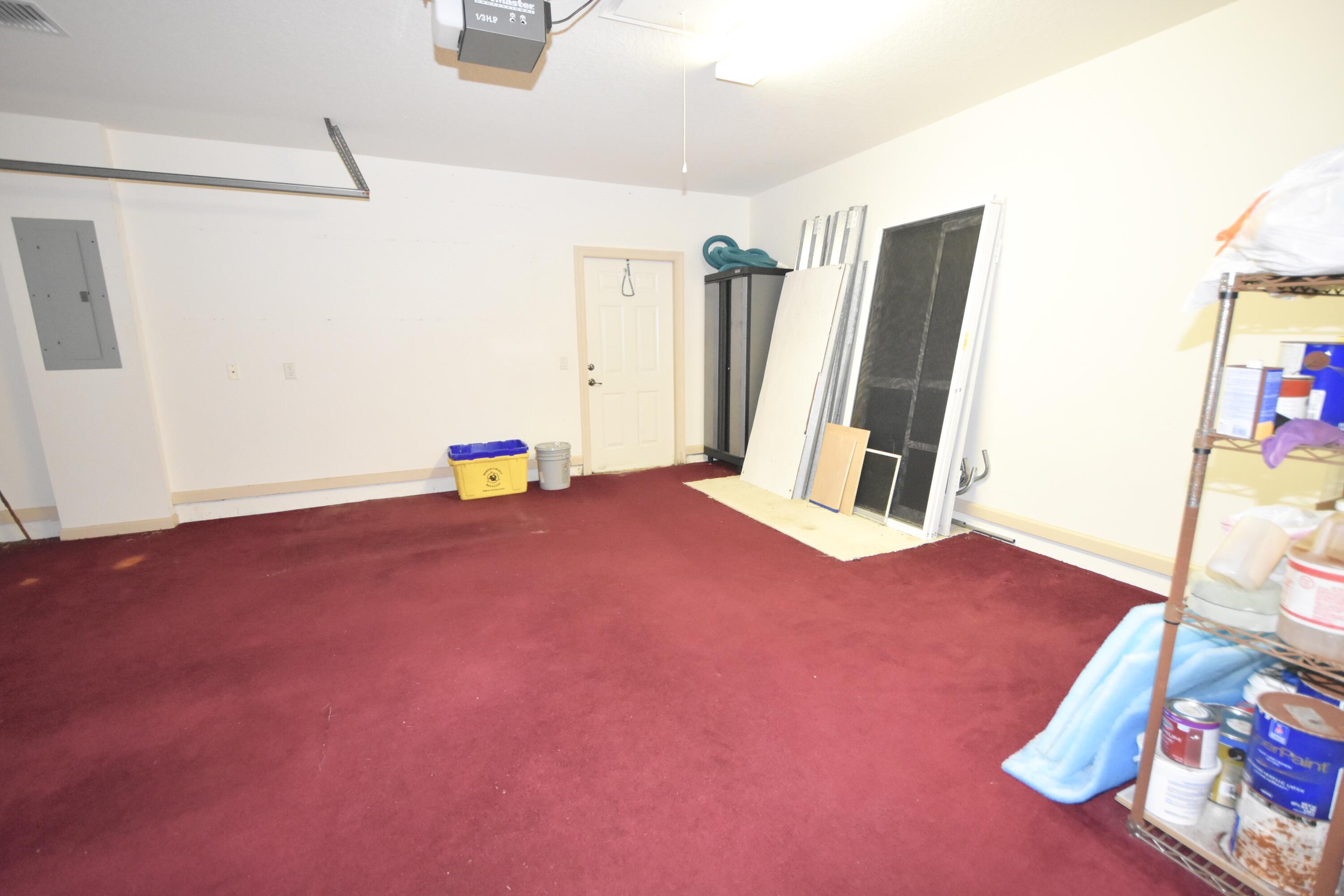 2464 Southwest Omega Way Stuart, FL 34997 - Photo 36 of 70 Garage air conditioned & insulated