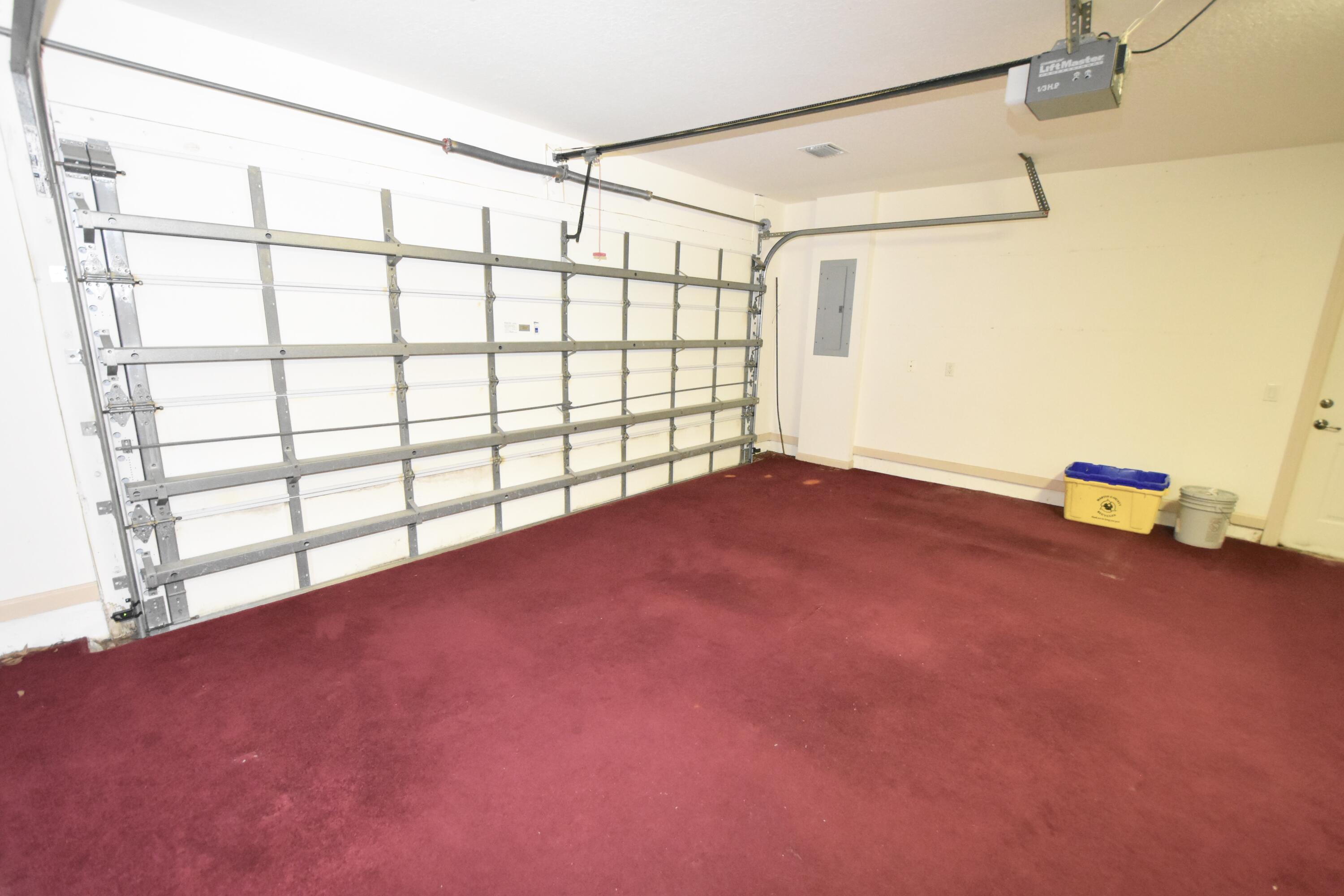 2464 Southwest Omega Way Stuart, FL 34997 - Photo 38 of 70 Garage air conditioned & insulated