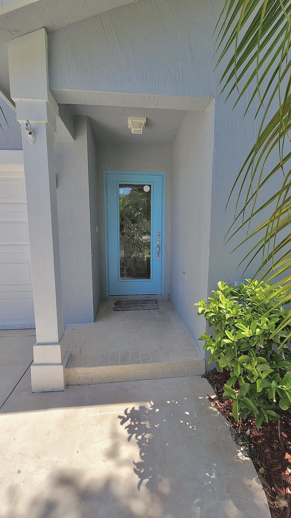 2464 Southwest Omega Way Stuart, FL 34997 - Photo 4 of 70 Front door