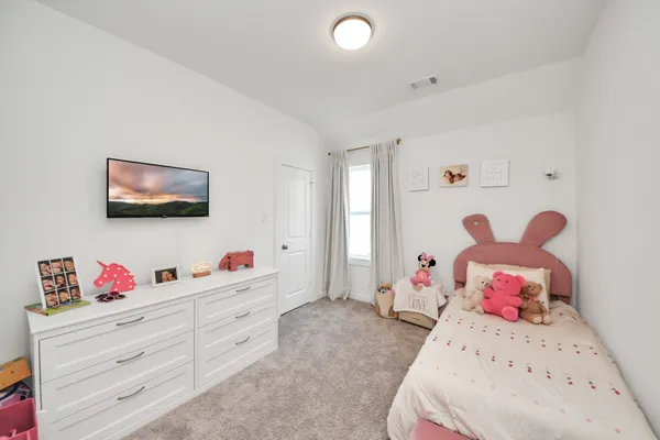 a view of a livingroom with furniture and cabinet