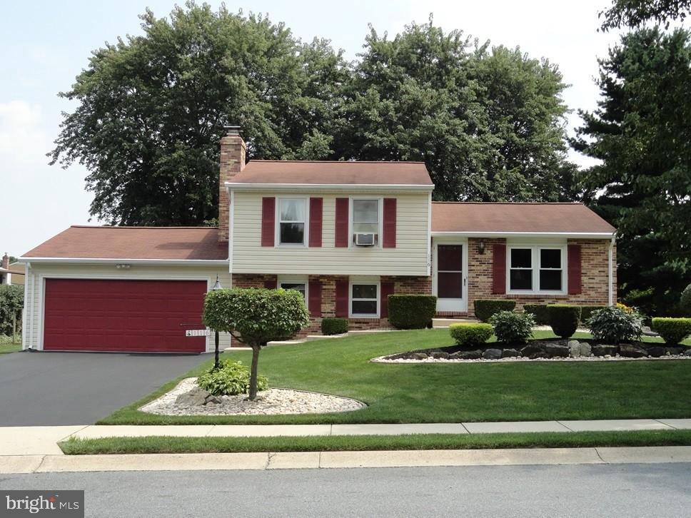 116 Winter Hill Road Lititz, PA 17543 - Photo 1 of 30 a front view of a house with a yard and garage