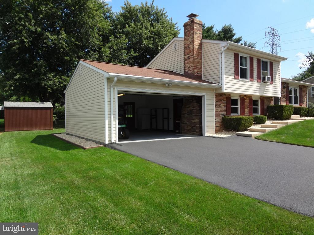 116 Winter Hill Road Lititz, PA 17543 - Photo 2 of 30 a front view of a house with a yard and garage