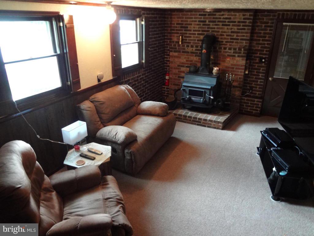 116 Winter Hill Road Lititz, PA 17543 - Photo 14 of 30 a living room with furniture and a flat screen tv