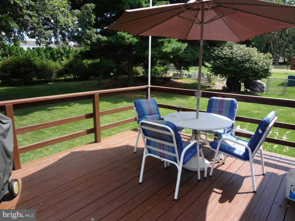 116 Winter Hill Road Lititz, PA 17543 - Photo 18 of 30 a view of wooden chairs and table in the patio