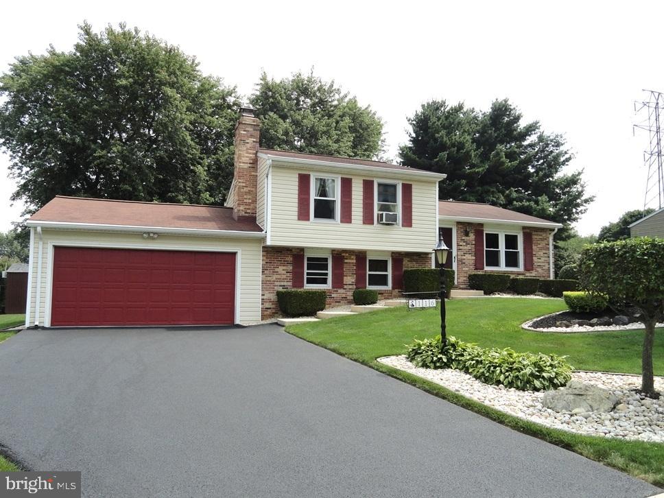 116 Winter Hill Road Lititz, PA 17543 - Photo 30 of 30 a front view of a house with a yard and garage