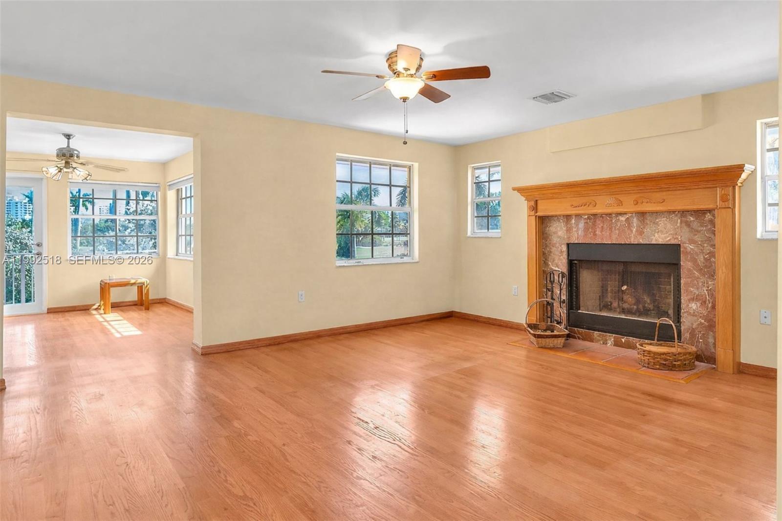 5309 Alton Road Miami Beach, FL 33140 - Photo 15 of 51 a view of an empty room with a window and fireplace