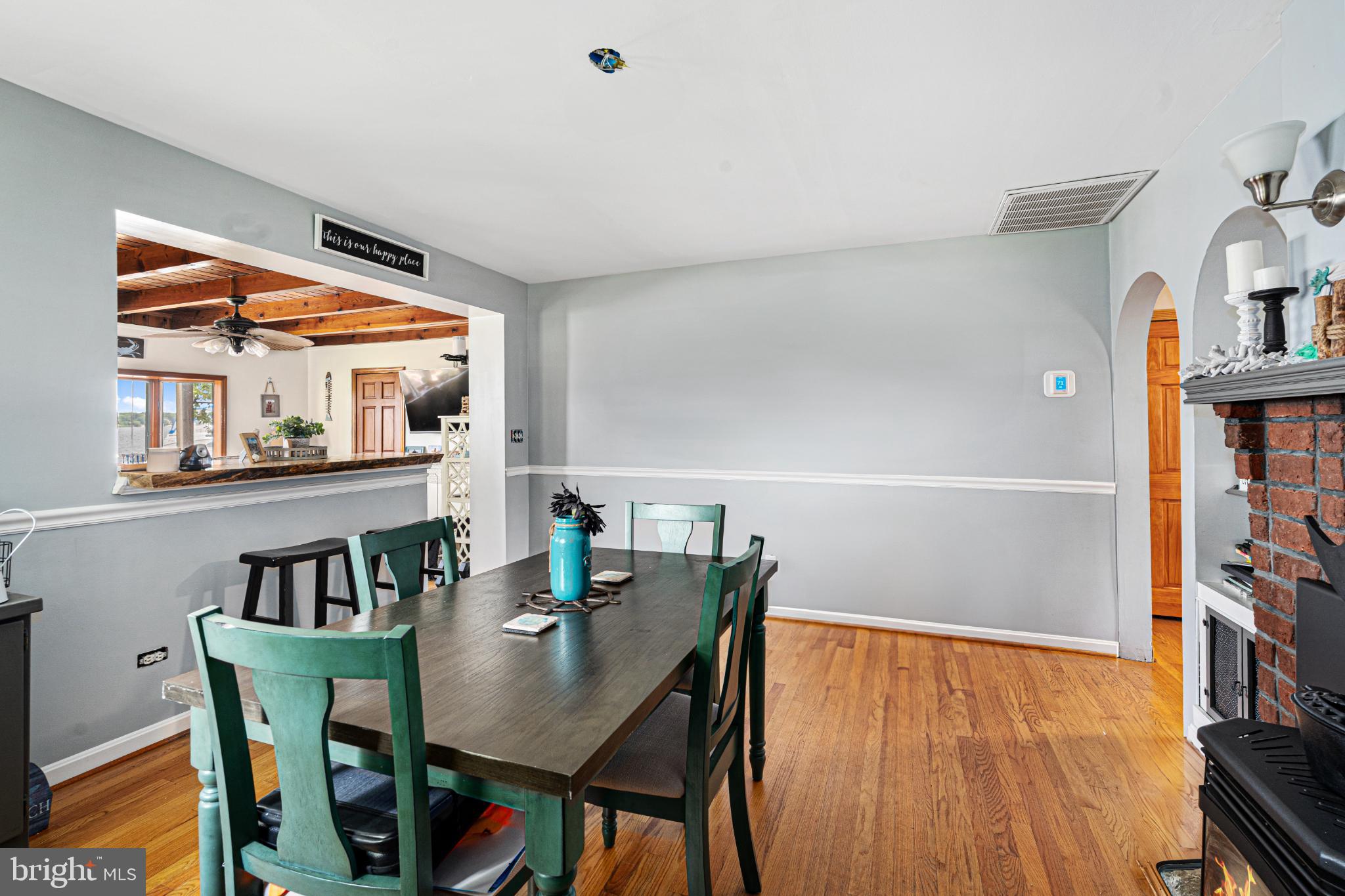 7118 River Drive Road Sparrows Point, MD 21219 - Photo 14 of 52 Inviting dining space with warm wood accents.
