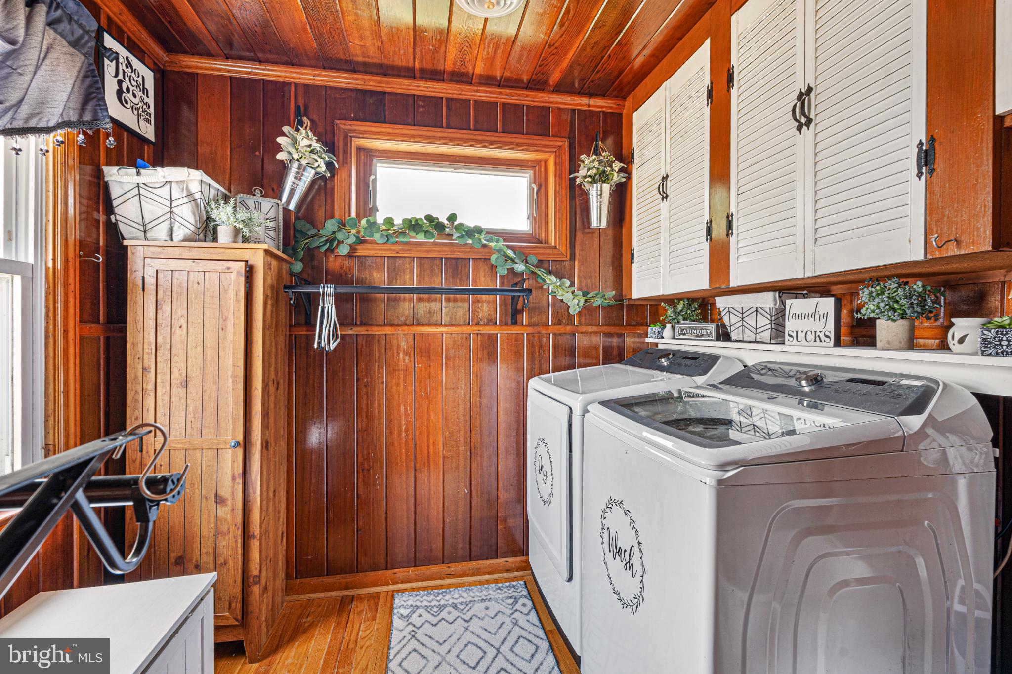7118 River Drive Road Sparrows Point, MD 21219 - Photo 24 of 52 Charming laundry nook with rich wood accents.