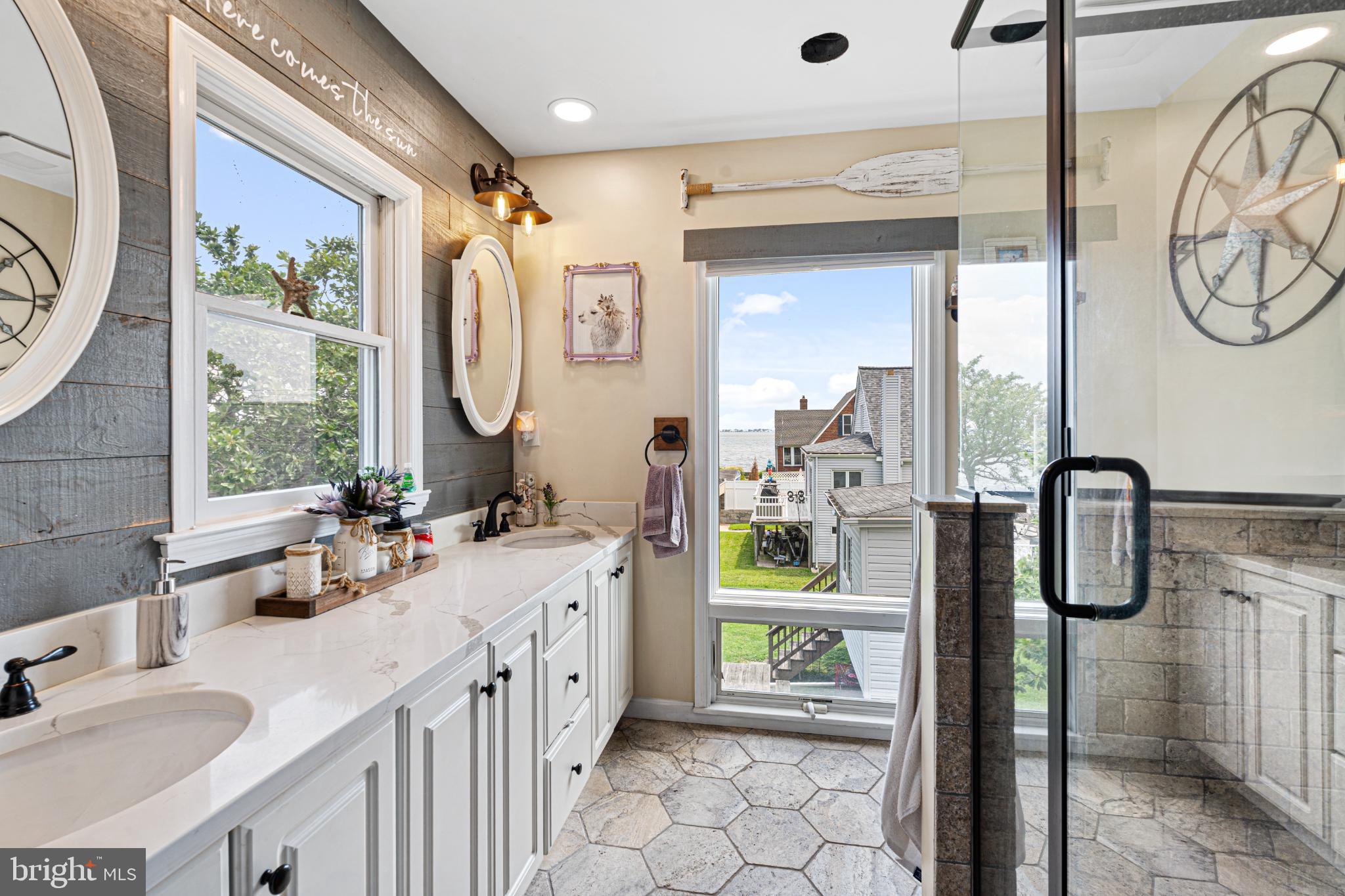 7118 River Drive Road Sparrows Point, MD 21219 - Photo 31 of 52 Serene bathroom with scenic water views.
