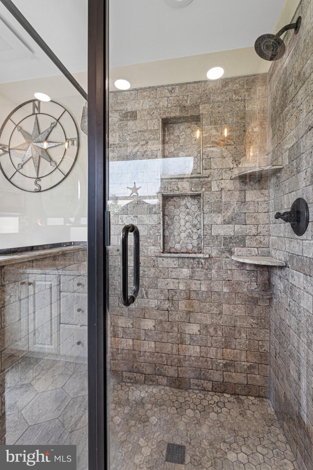 7118 River Drive Road Sparrows Point, MD 21219 - Photo 33 of 52 Elegant stone shower with modern fixtures.