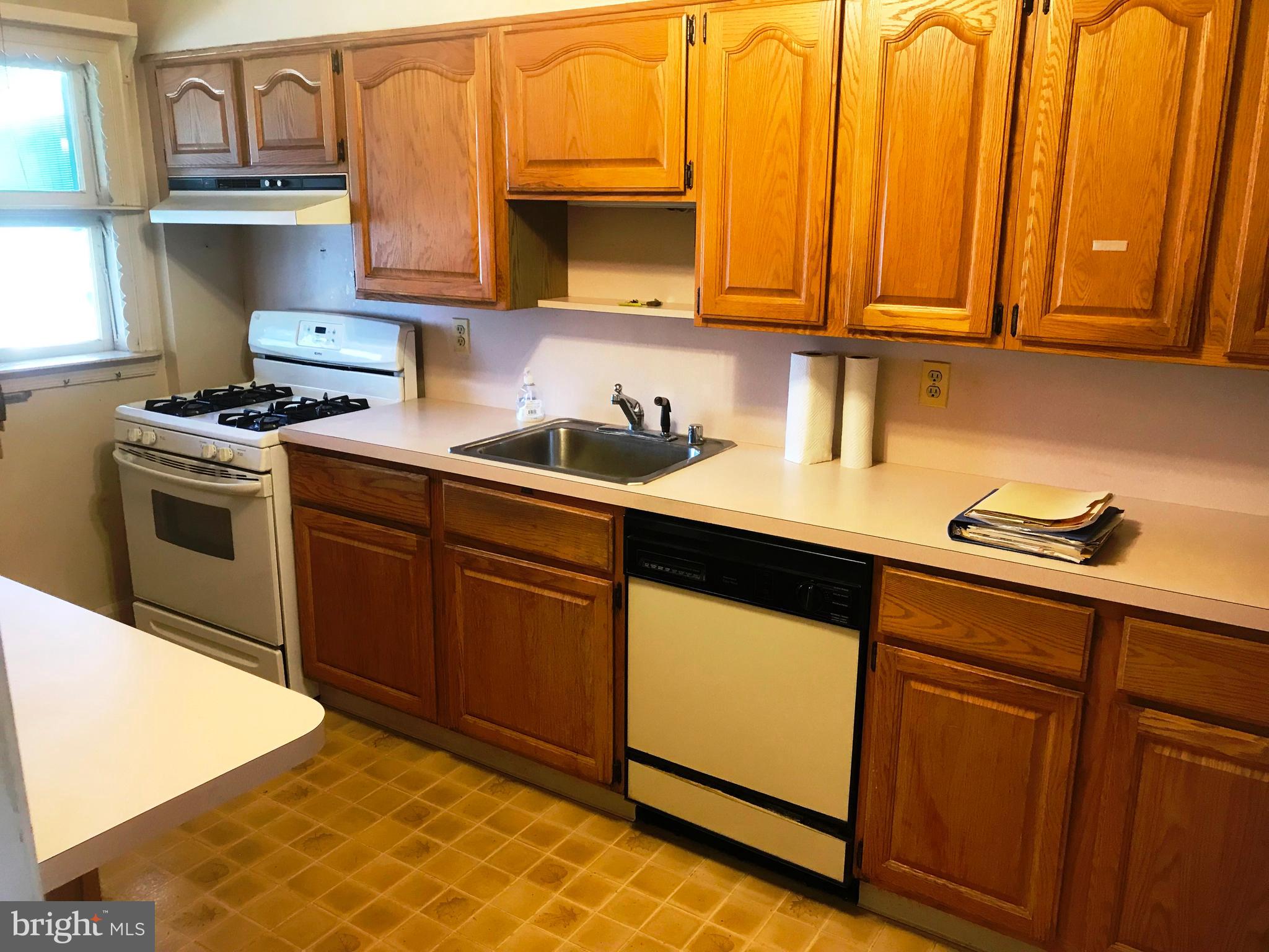 Kitchen w/ wood cabinetry