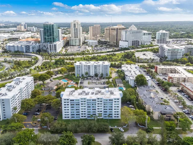 a view of a city with tall buildings