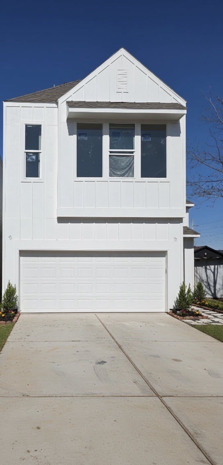 313 Tennessee Street Houston, TX 77029 - Photo 12 of 15 a front view of a house with garage