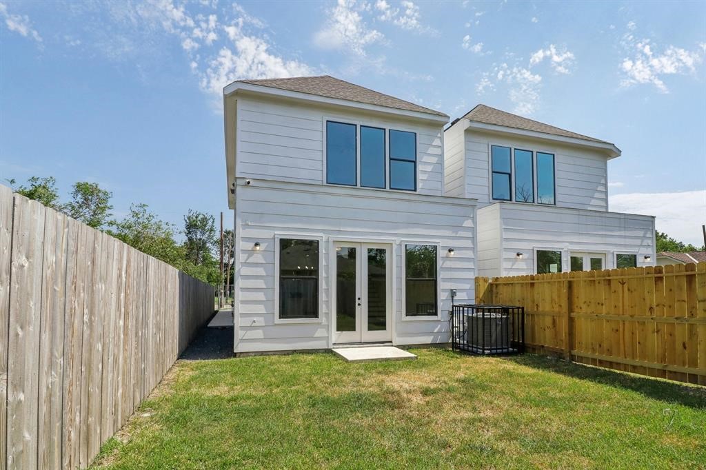 313 Tennessee Street Houston, TX 77029 - Photo 10 of 15 a view of a house with backyard and porch