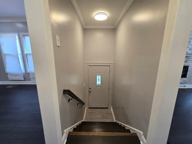 a view of hallway with stairs