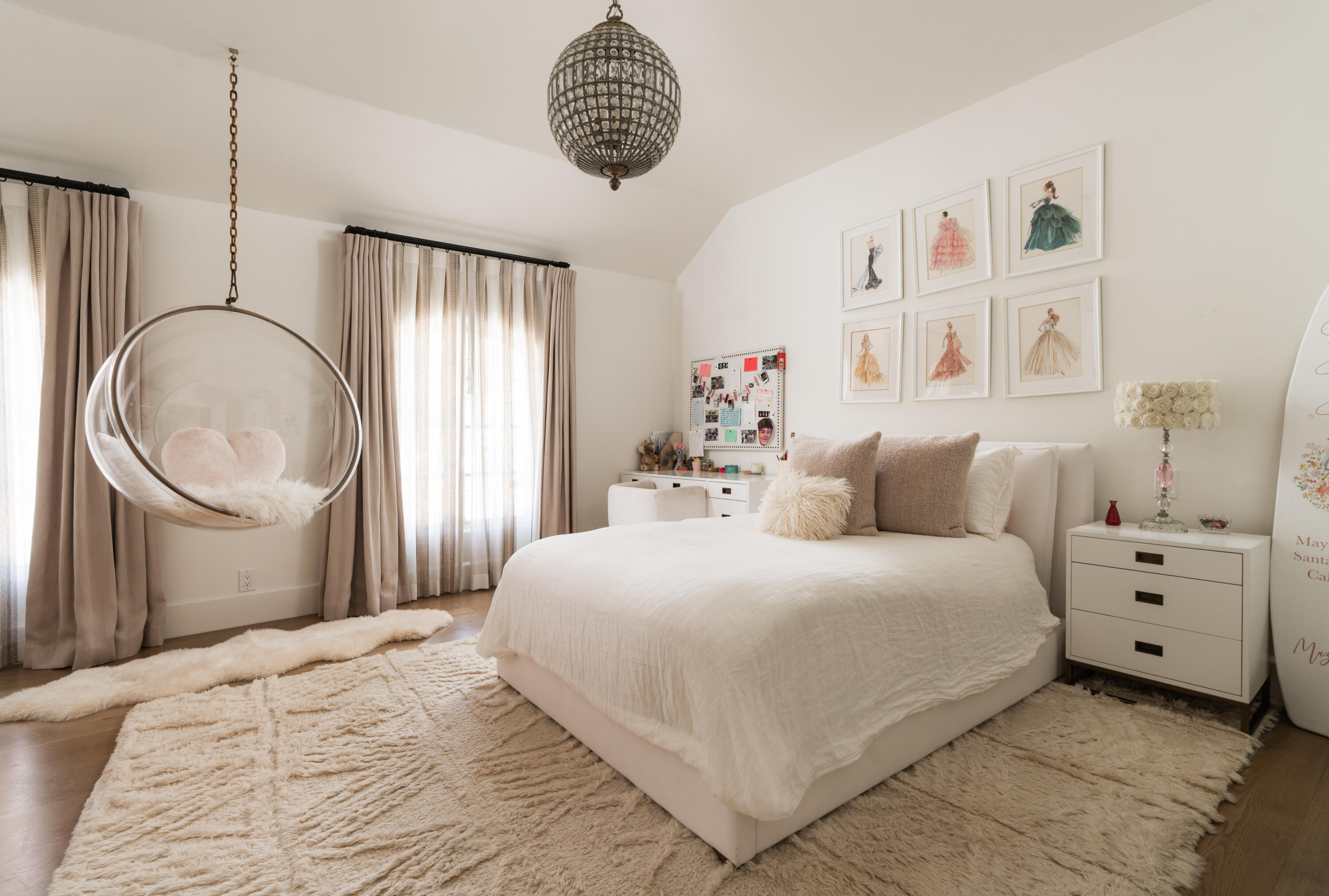 1567 East Valley Road Montecito, CA 93108 - Photo 21 of 34 a bedroom with a large bed and a chandelier