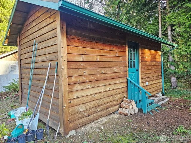 a backyard of a house with lots of green space