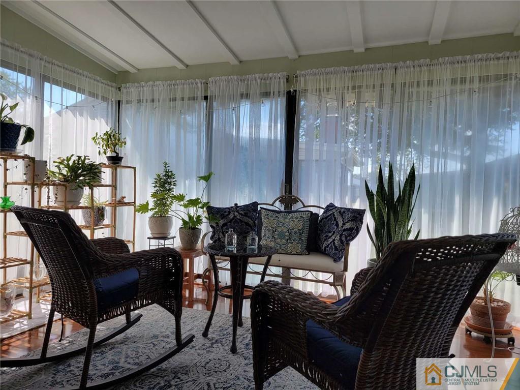 35 Haddon Road, Unit A Monroe Township, NJ 08831 - Photo 14 of 18 a view of a dining room with furniture window and outside view