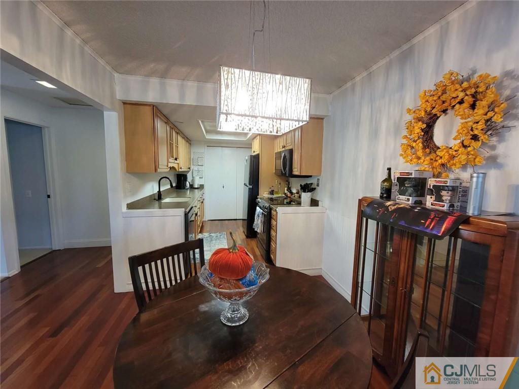 35 Haddon Road, Unit A Monroe Township, NJ 08831 - Photo 5 of 18 a view of a dining room with furniture